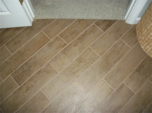 wood_grain_ceramic_tile - Unique Builders & Development Inc.