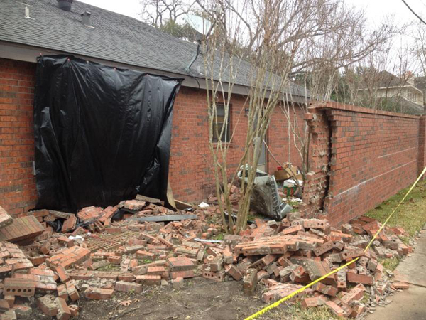 Bellaire home: Outside wall after SUV accident